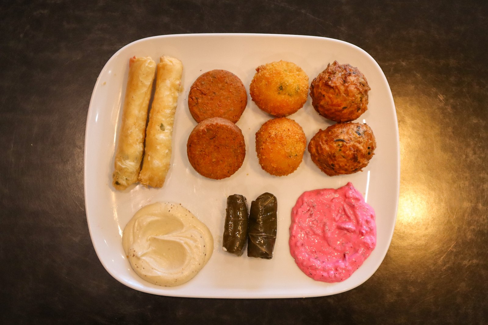 Hearty Turkish main dishes - traditional grilled meats with rice and fresh vegetables